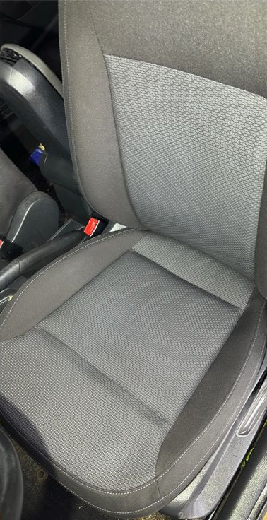 Front fabric car seat after interior detailing